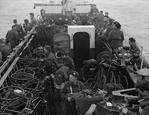 A Gib Milne photo from the bridge of LCI 306, looking at the men and bicycles in the bow.