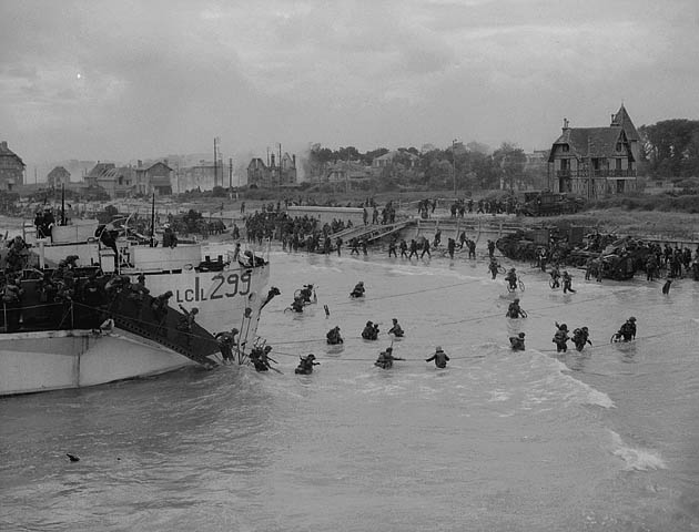 Gib Milne takes this iconic series of shots of LCI 299 on D-Day.