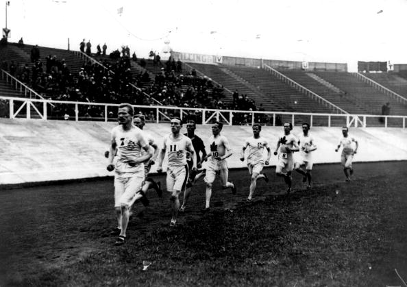 Five Mile Race in White City Stadium on 18th July 1908. Emil Voigt of Great Britain leads the pack on his way to the gold medal.
