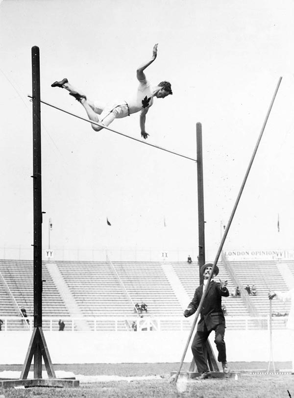 Ed Archibald competes in the pole vault competiton. He would tie for bronze.