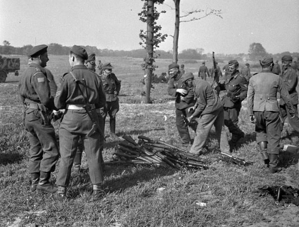 German soldiers handing in weapons